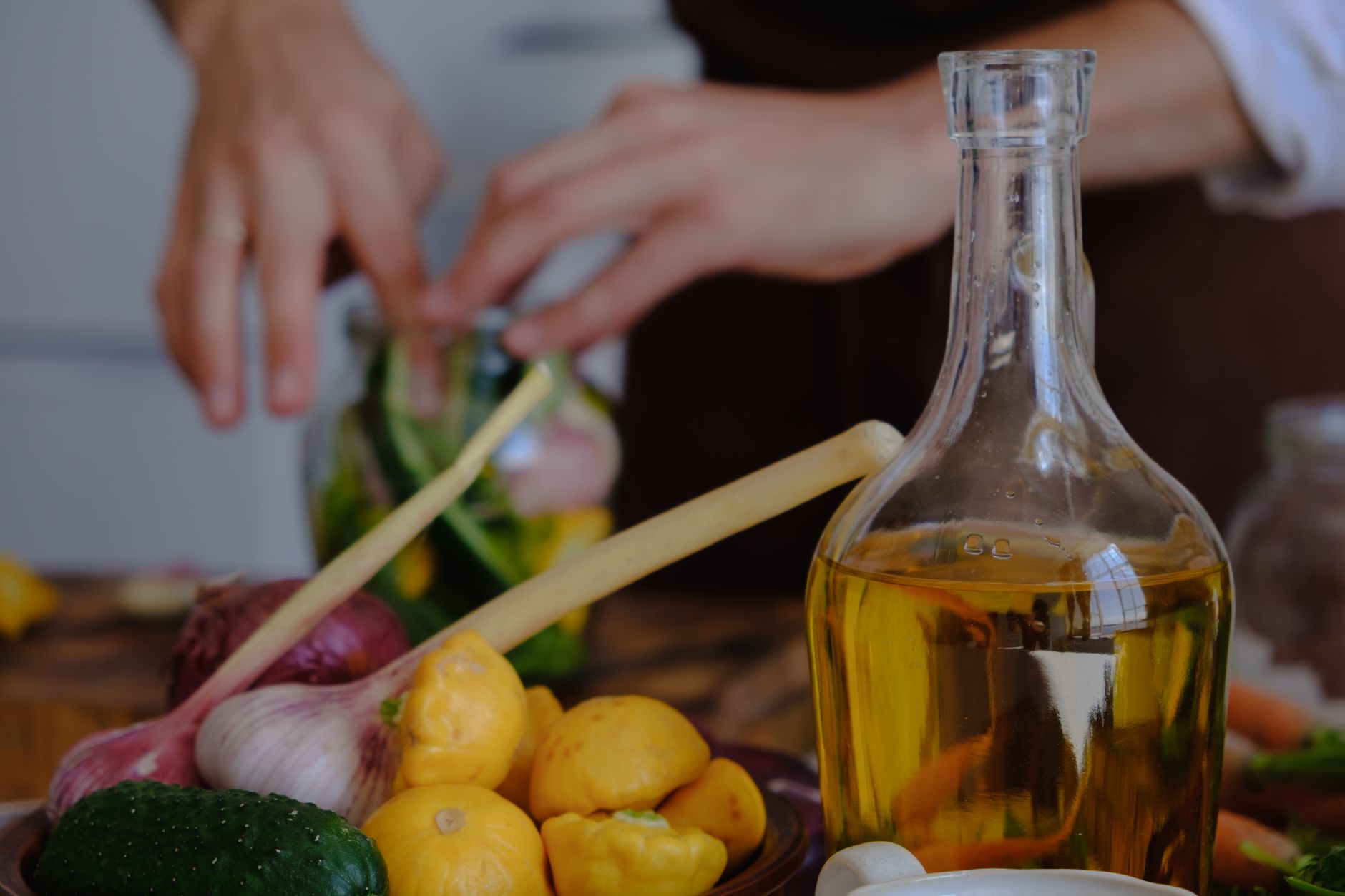 Various cooking oils on a kitchen counter, relevant to the seed oils inflammation UK debate